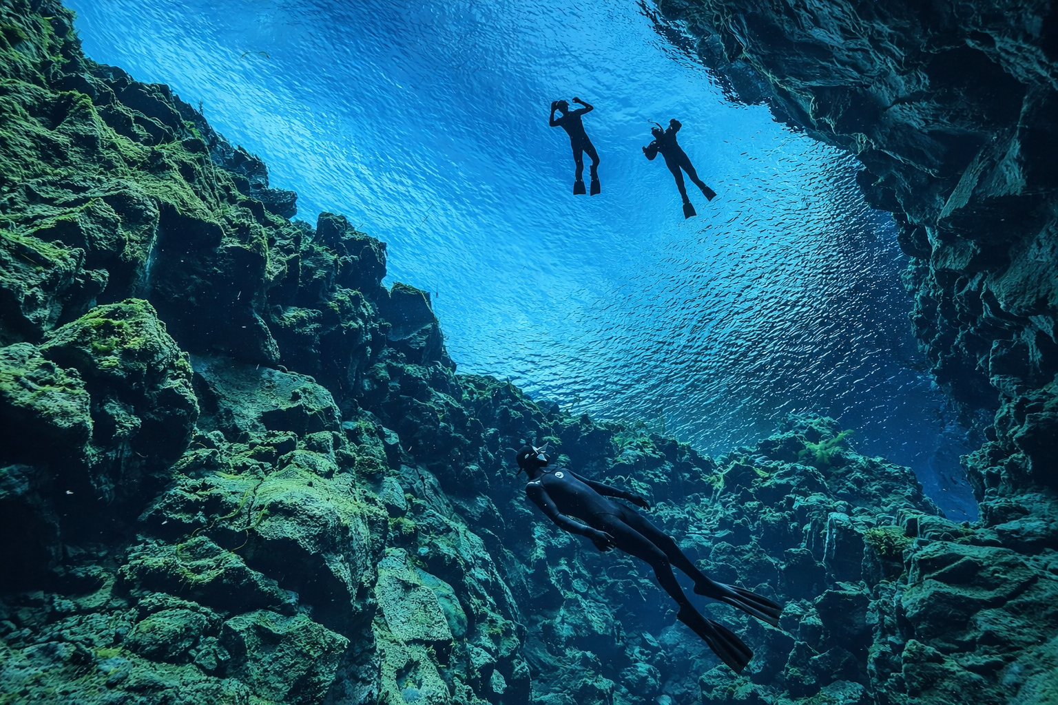 Snorkeling between tectonic plates in the crystal clear water of Silfra fissure
